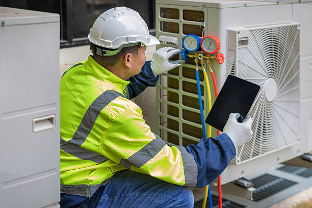 Professional Emergency Ac Repair technician working in Kings Park, NY